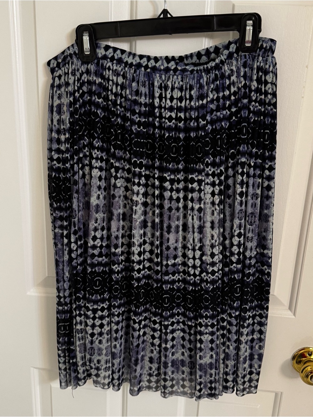 Spense Pleated Midi Skirt in Navy and Black Geometric Print